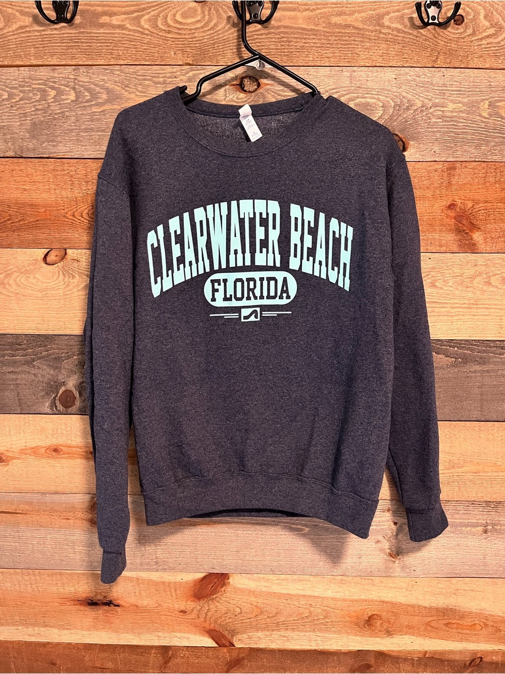 Dark Gray Crewneck Sweatshirt with Light Blue Clearwater Beach Graphic. Size Sma
